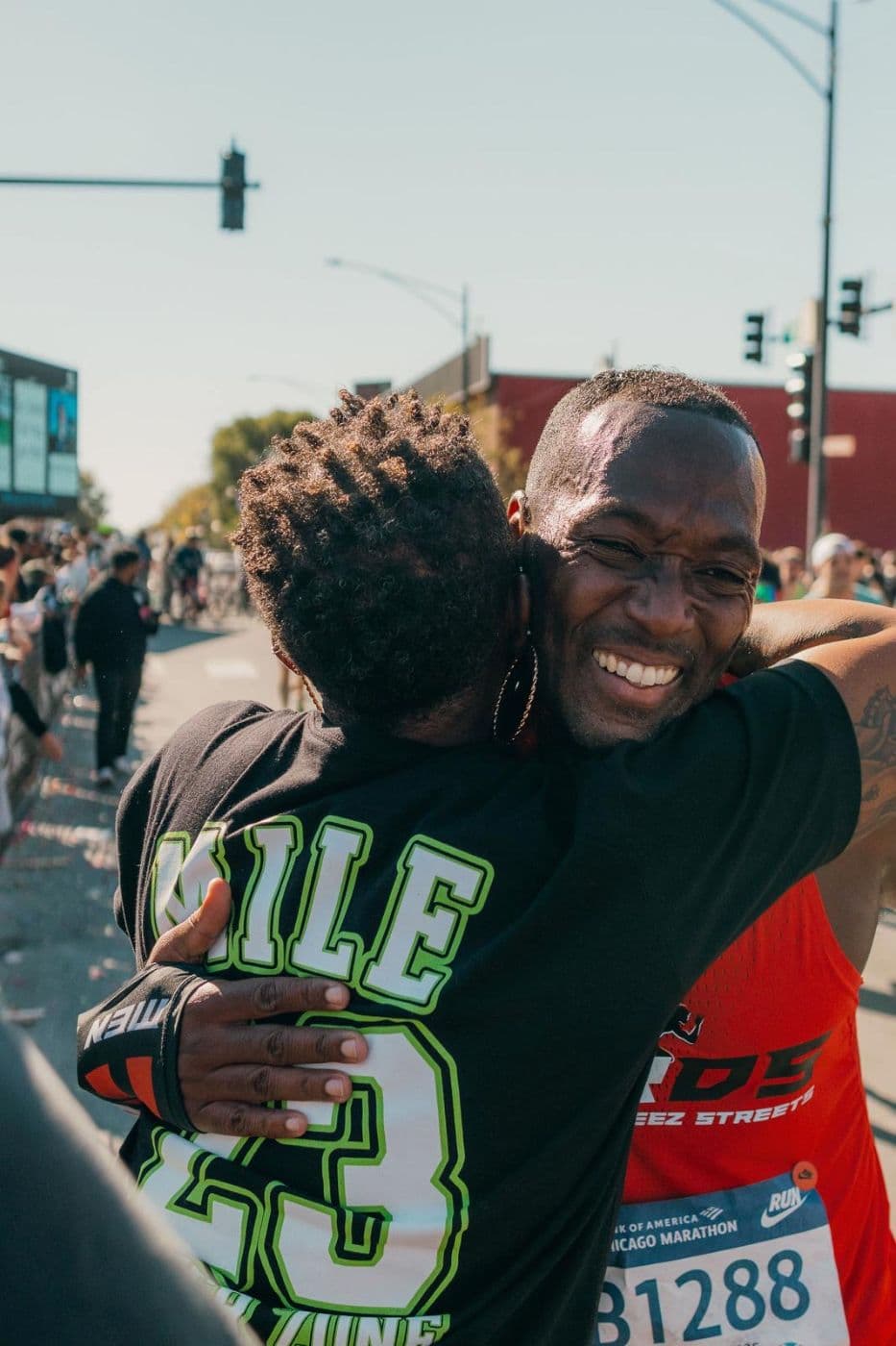 Runner hug at Mile 23