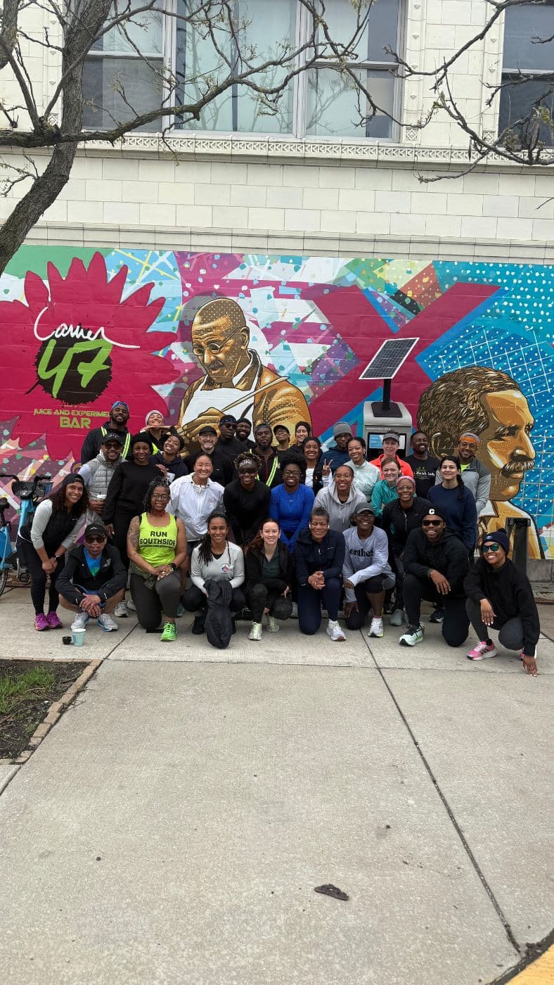 Crew in front of the mural on 47th Street